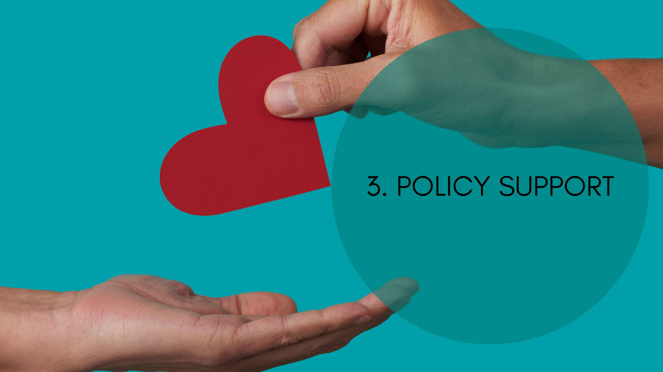 Image of a hand giving another hand a red paper heart